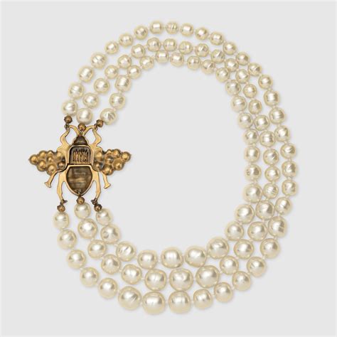 pearl and bee gucci puruse|gucci bee necklace gold.